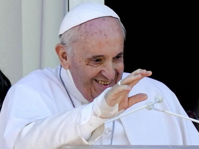 Pope Francis appears on a balcony of the Agostino Gemelli Polyclinic in Rome, where he was recovering from intestinal surgery, for the traditional Sunday blessing and Angelus prayer on July 11, 2021. Pope Francis left the hospital Wednesday to continue his convalescence at the Vatican.