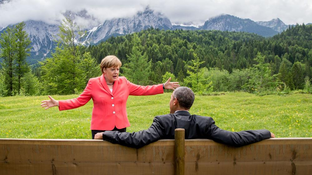 Merkel chats with then-President Barack Obama after a working session of the G-7 summit near Garmisch-Partenkirchen in southern Germany in 2015.