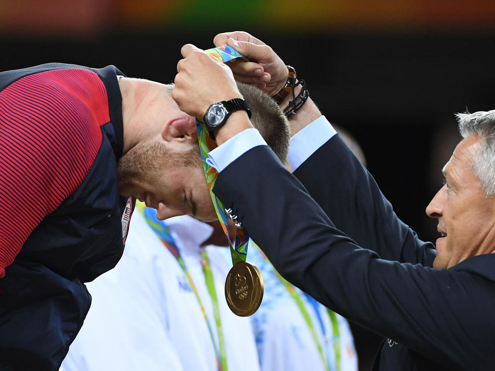American gold medalist Kyle Frederick Snyder receives his medal at the end of the men's 97-kilogram freestyle wrestling event during the 2016 Olympic Games in Rio de Janeiro.