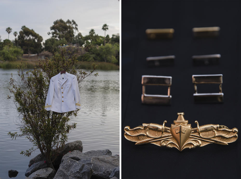From left to right, Lyla Kohistany's U.S. Navy uniform jacket that was worn during the summer season hangs on a tree, and Kohistany's U.S. Navy pins, from front to back, the Surface Warfare Officer pin, silver lieutenant bars, silver lieutenant junior grade bars and gold ensign bars sit on a jacket at Lake Murray in San Diego on July 2, 2021.