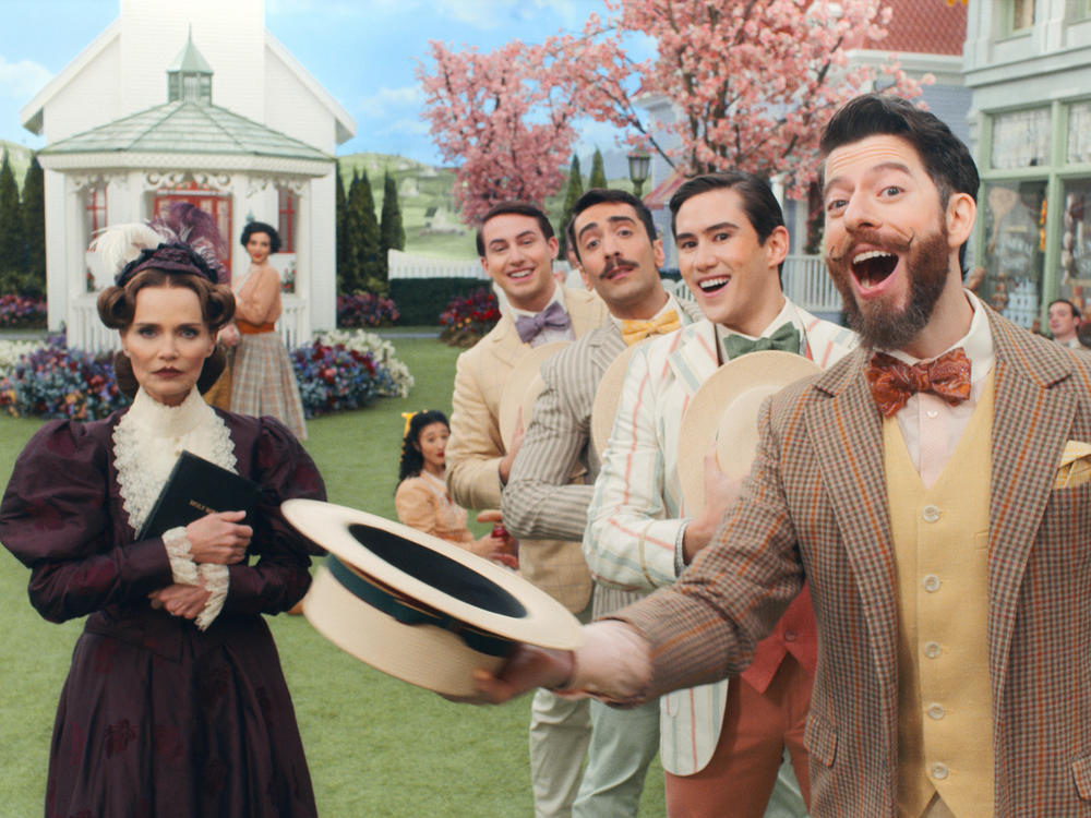 Kristin Chenoweth and the company of <em>Schmigadoon!</em>, premiering July 16 on Apple TV+.