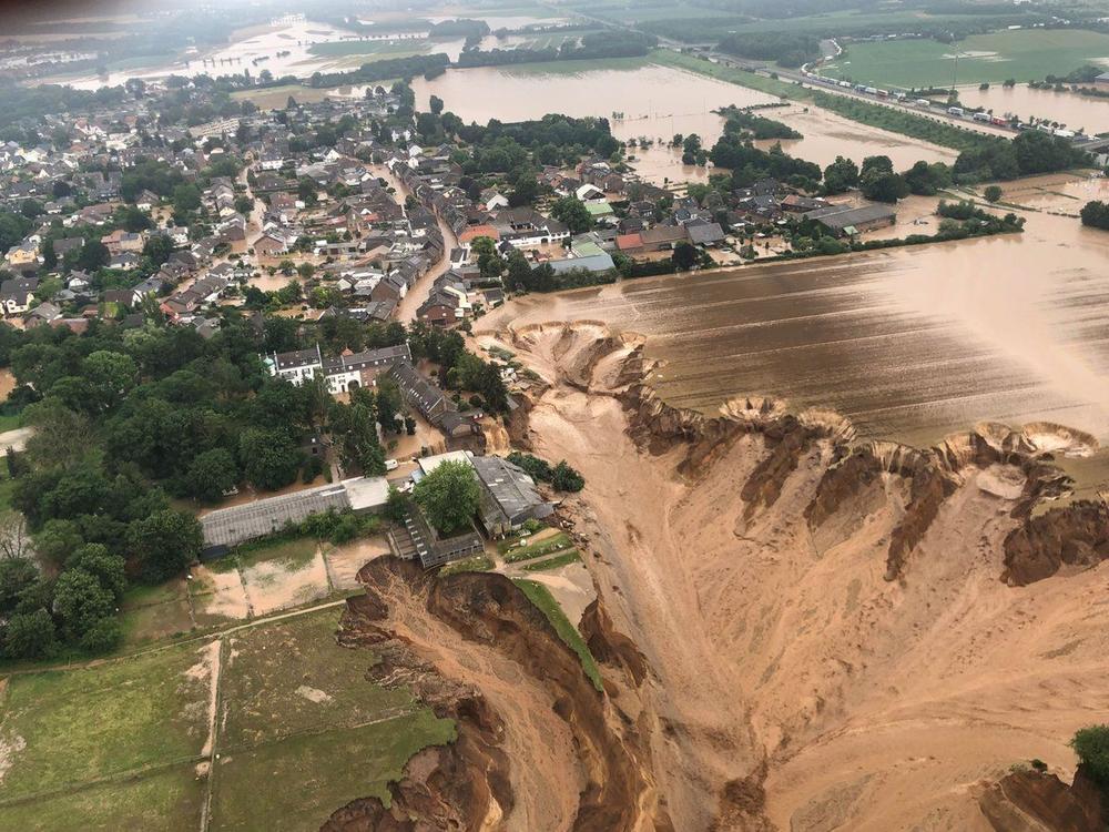 Flooding has led to the collapse of an entire field in Rhein-Erft-Kreis, a district in western Germany. Officials have said a warming climate is at least partially to blame for floods.