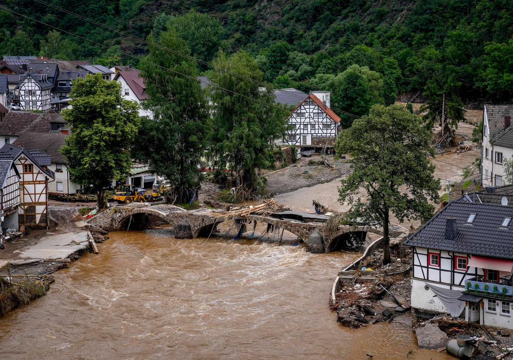 A bridge is destroyed over the Ahr River in Schuld on Thursday after flooding due to heavy rainfall.
