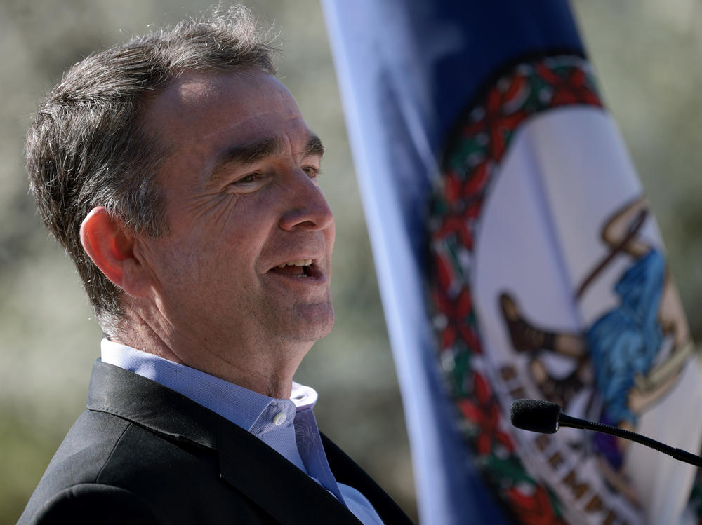 Virginia Gov. Ralph Northam, here at a March event, has outlined a $700 million investment to boost broadband access and help close the digital divide for some of the state's poorest regions.