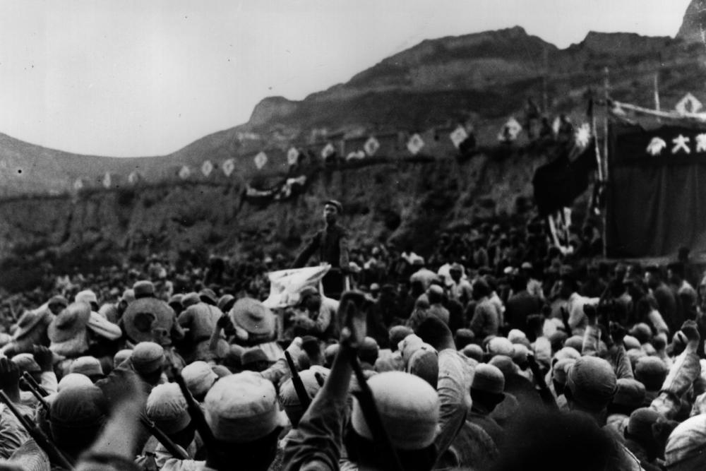 A mass meeting circa 1938 in Yenan, near the Great Wall, at the end of the Long March during the Sino-Japanese War.