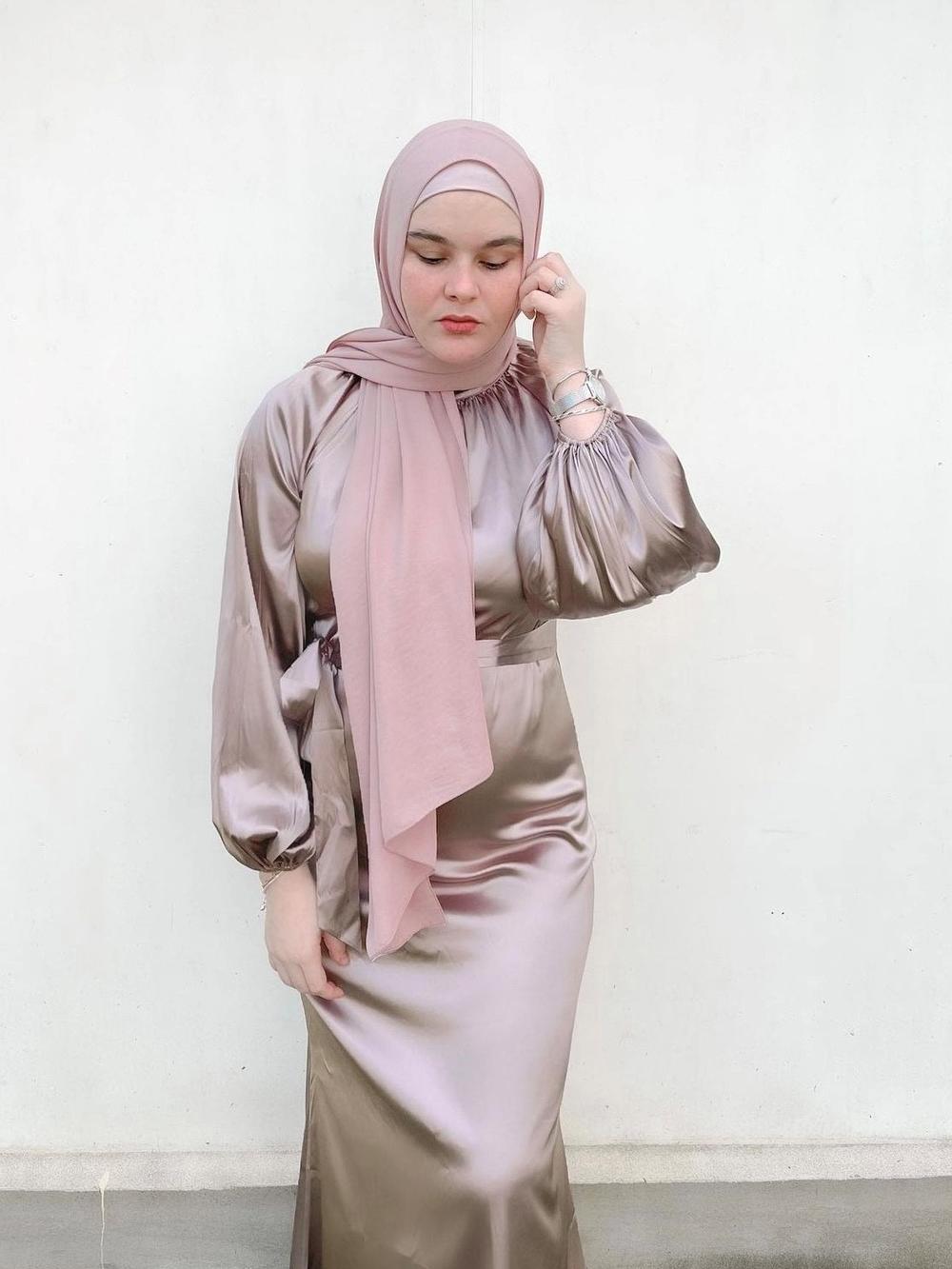Australian influencer Samantha Boyle wears Nea Wear's satin maxi dress.