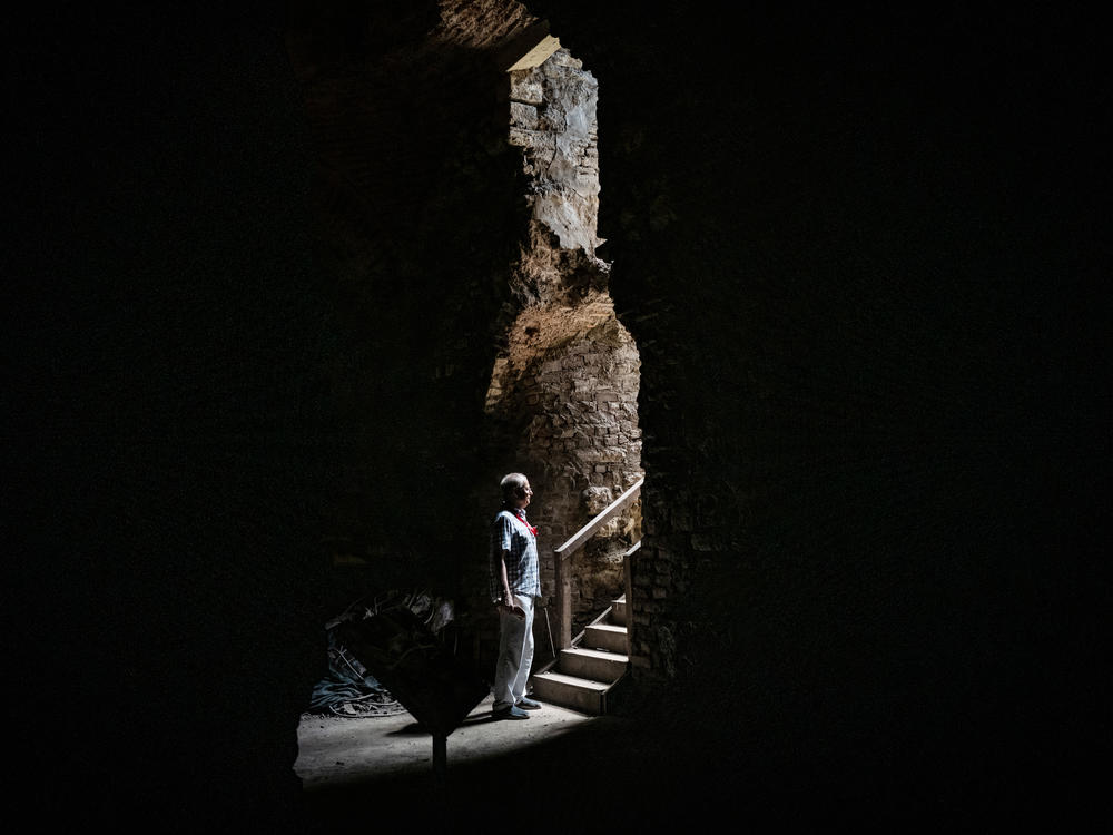Archaeologist Ferudun Ozgumus stands in what is believed to be a Byzantine-era substructure in Istanbul.