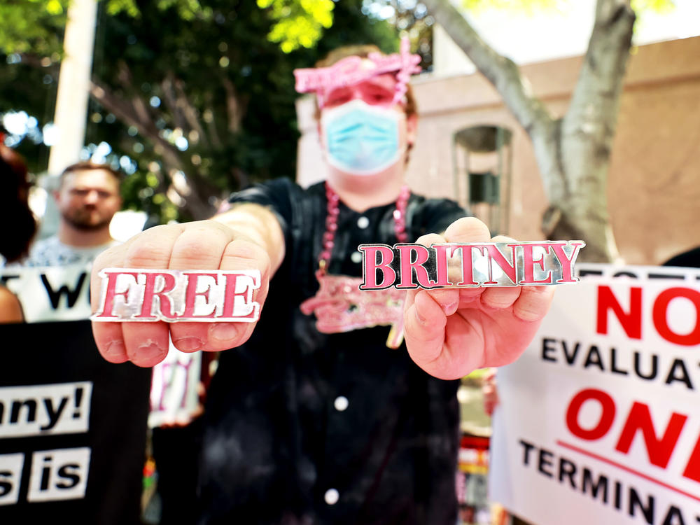 Protesters attend a #FreeBritney Rally at Stanley Mosk Courthouse on Wednesday in Los Angeles. The group is calling for an end to the 13-year conservatorship led by the pop star's father, Jamie Spears, who has control over her finances and business dealings.