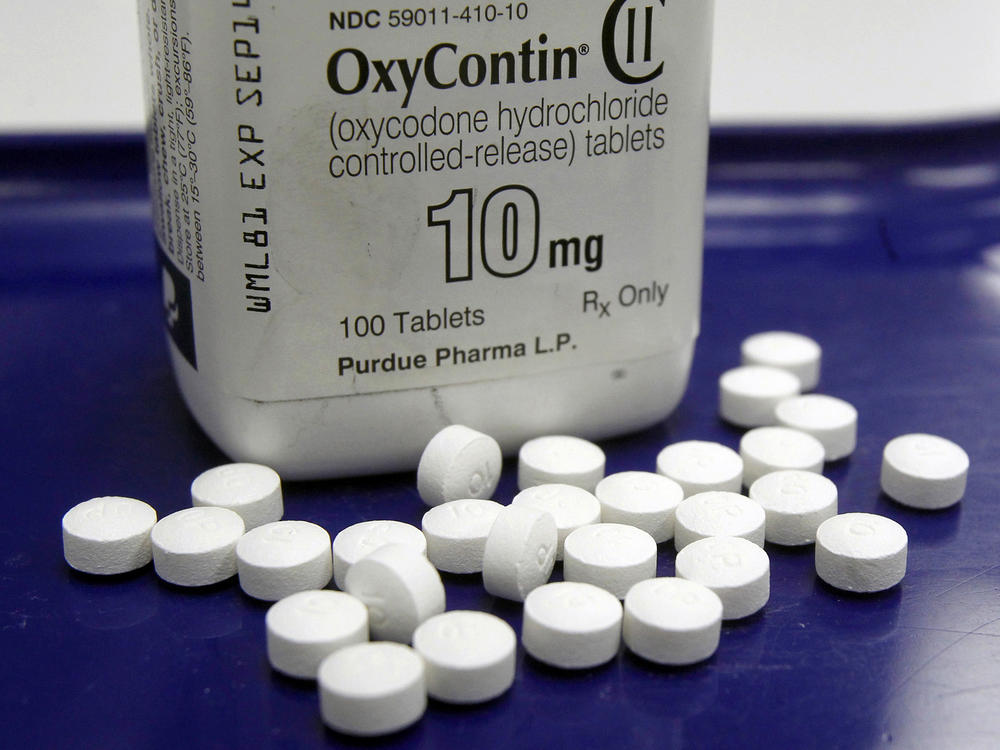 A 2013 file photo shows OxyContin pills at a pharmacy in Montpelier, Vt.