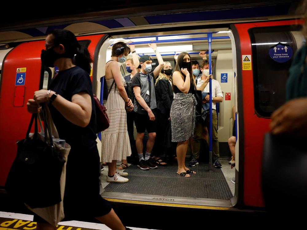 Commuters on the London Underground continue to wear masks on Monday, as required on the Transport for London network.