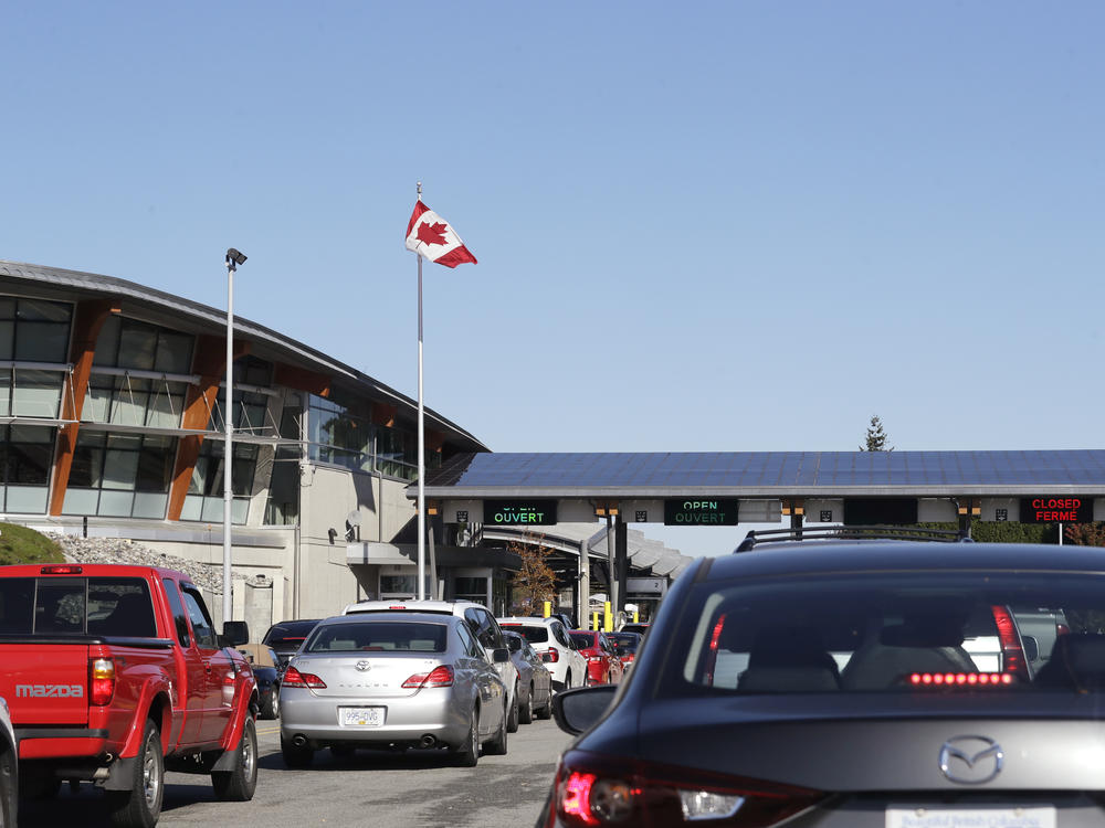 Traffic enters Canada from the United States at the Peace Arch Border Crossing in Blaine, Wash., in 2019. Vaccinated Americans will be able to travel to Canada, starting Aug. 9.