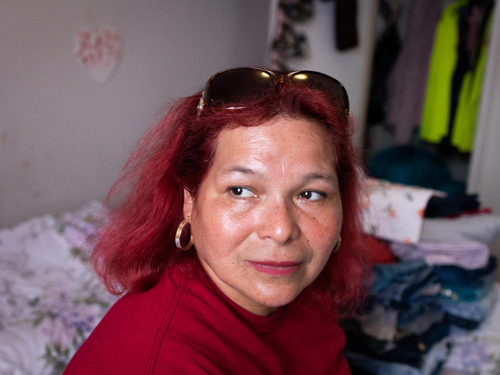 María Lara sits in her bedroom in the Bedford and Victoria Station apartment complex in Langley Park, Md., a densely populated, low-income suburb of Washington, D.C.