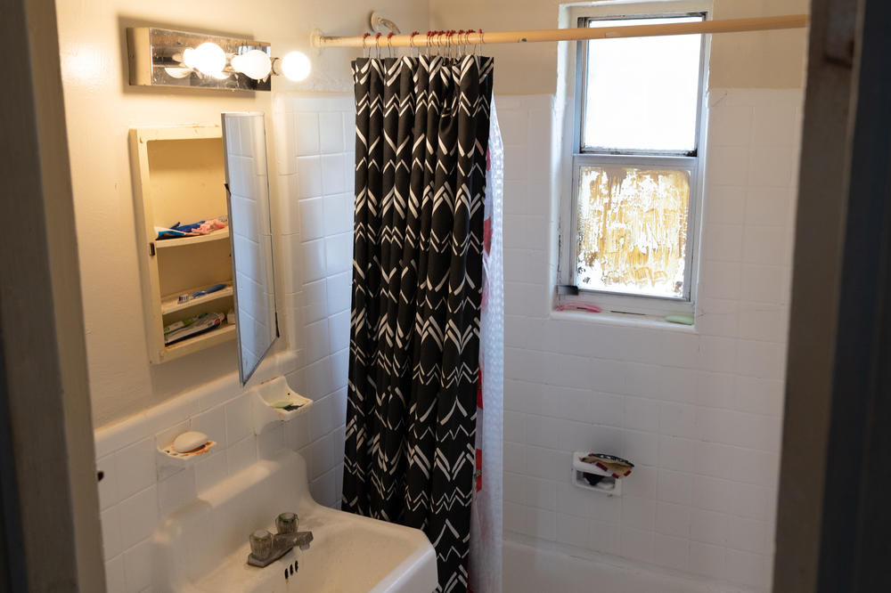 Jesús González says that the landlord recently repainted his bathroom after a drawn-out dispute.