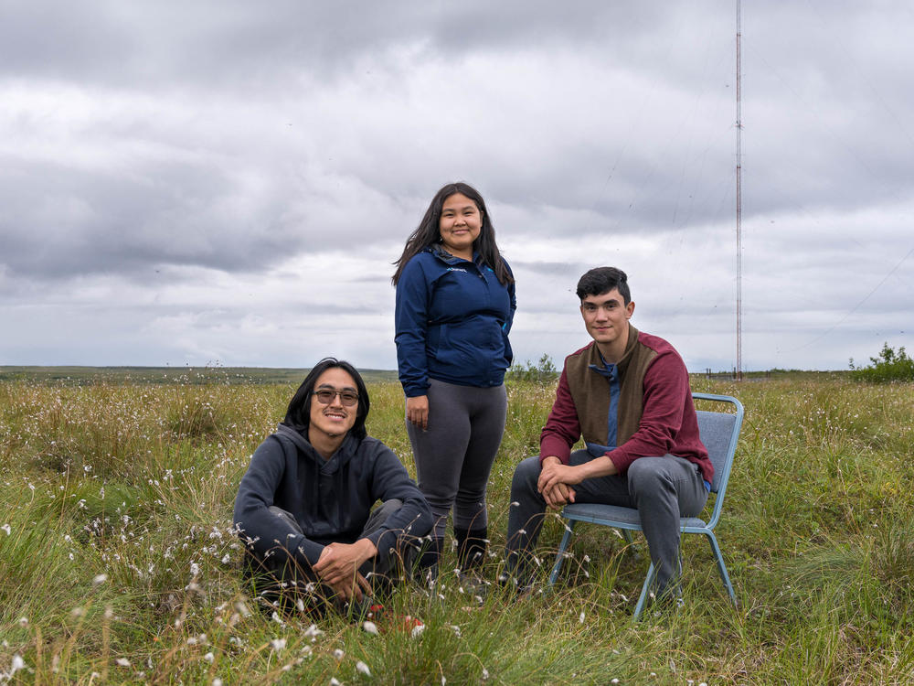 High schoolers Ethan Lincoln, Kaylee King and Jamin Crow's podcast about their experiences subsistence hunting is a finalist in the NPR Student Podcast Challenge. The students are pictured here at the KYUK radio transmitter site in Bethel, Alaska.