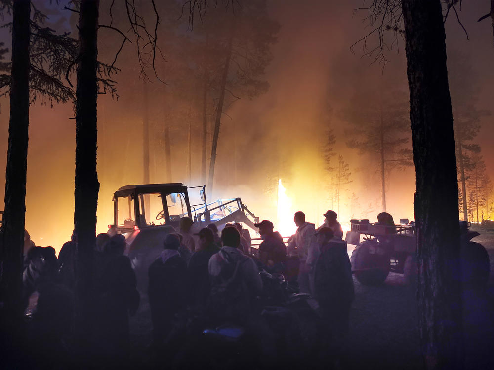 Volunteers fight a wildfire in northeastern Siberia on July 17th. Heat waves in the Russian Arctic and boreal forests have fueled intense, widespread blazes that can damage trees and release enormous amounts of stored carbon dioxide from forests and permafrost.