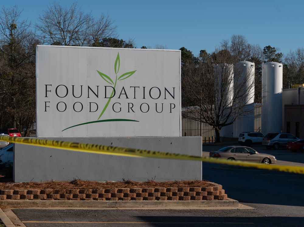 Tanks of liquid nitrogen are seen at the Foundation Food Group poultry processing plant in Gainesville, Ga. Six workers died after a freezer malfunctioned in January 2021.