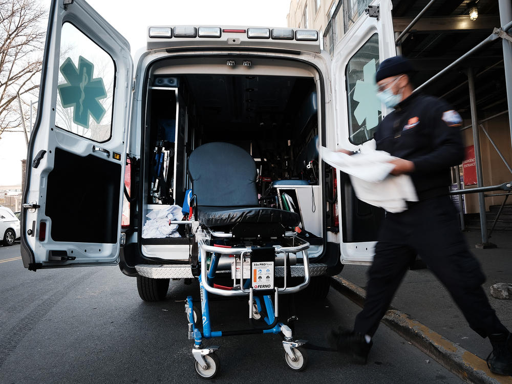 New York City has started the Behavioral Health Emergency Assistance Response Division, or B-HEARD, to provide more targeted care for those struggling with mental health issues. Here in March, an EMT worker cleans a gurney after transporting a suspected COVID-19 patient.
