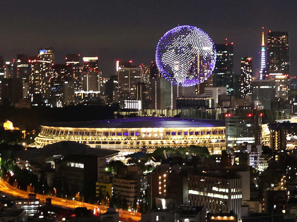 Exactly 1,824 drones were used to form the massive orb over Tokyo's Olympic Stadium during Friday's opening ceremony.