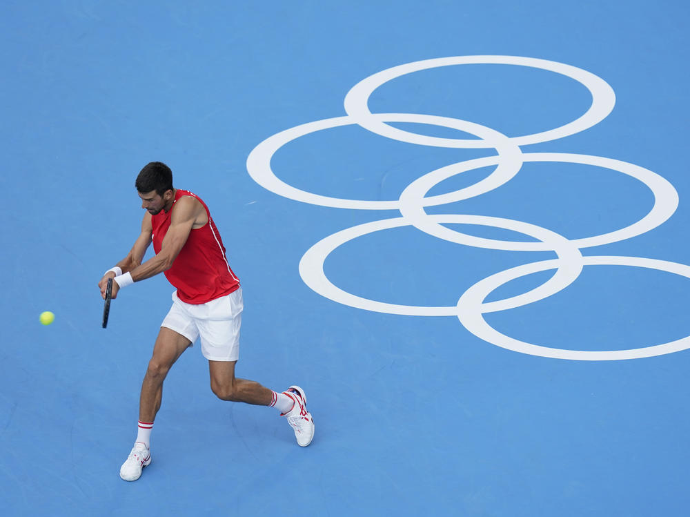 Serbia's Novak Djokovic practices for the men's tennis competition on Thursday at the Summer Olympics.