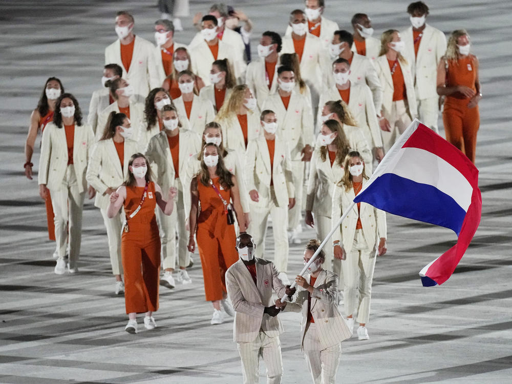 The Dutch Olympic team, shown here during the opening ceremony on Friday, has had three athletes test positive for coronavirus at the Games.