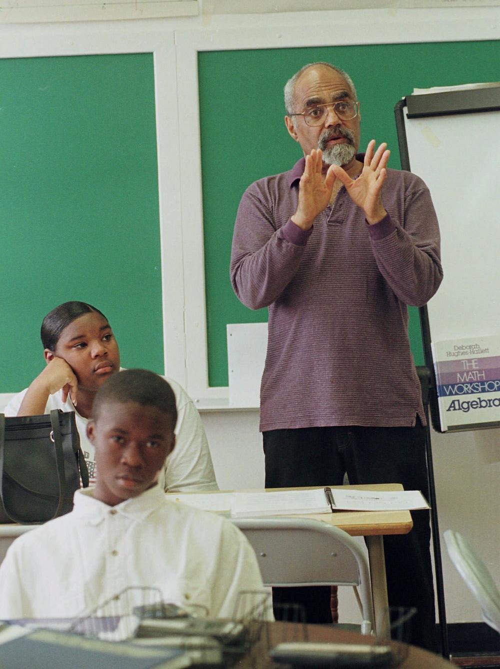 Moses teaches an algebra class at Lanier High School in Jackson, Miss., in 1990.