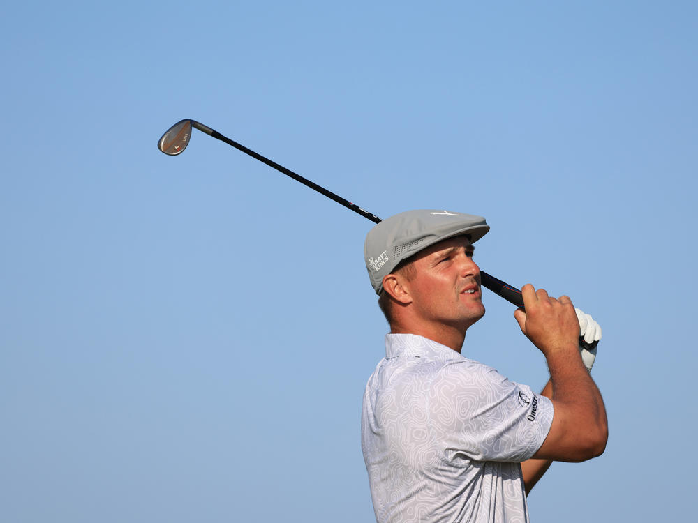 Bryson DeChambeau of the United States tested positive for the coronavirus before leaving the U.S. for the Tokyo Olympics. He's shown here earlier this month playing at the Open Championship in Scotland.