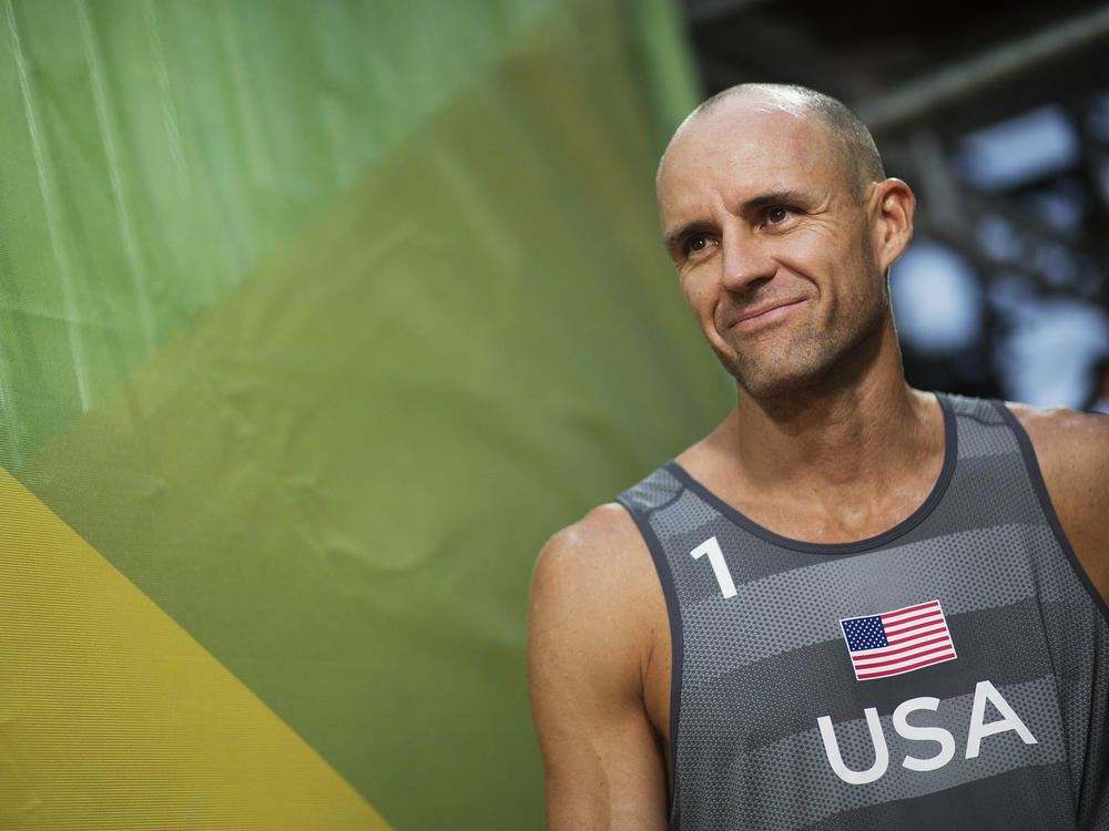 U.S. beach volleyball player Jake Gibb, shown here in 2016, is continuing to compete in the Tokyo Olympics after his partner tested positive for the coronavirus.
