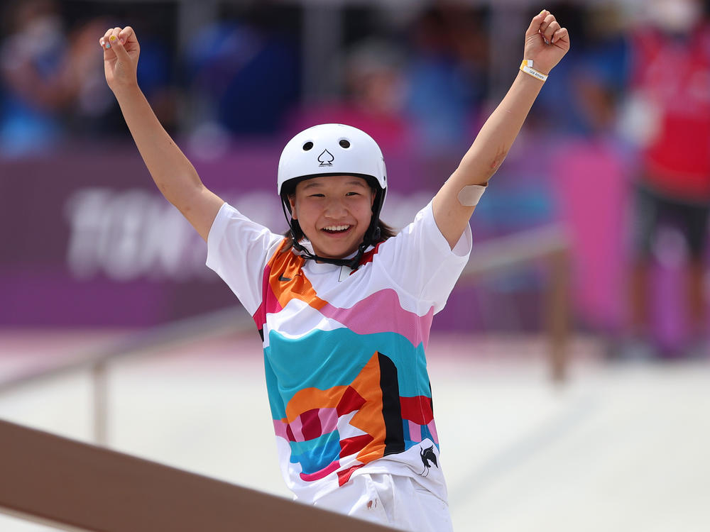 Momiji Nishiya of Team Japan celebrates during the Women's Street Final on day three of the Tokyo 2020 Olympic Games on Monday at Ariake Urban Sports Park.