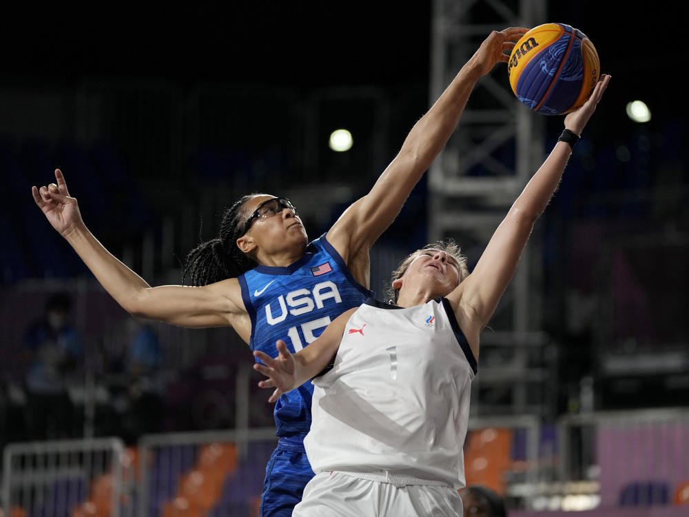 U.S. player Allisha Gray blocks a shot by Yulia Kozik from Russia on Sunday during a women's 3-on-3 basketball game at the 2020 Summer Olympics in Tokyo.