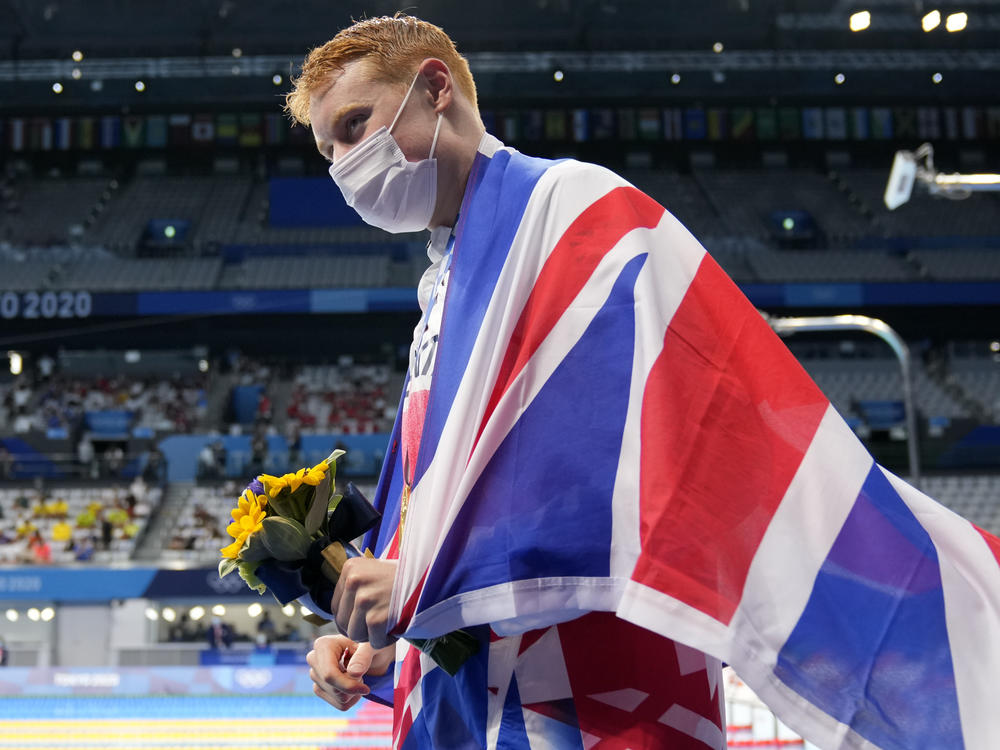 Tom Dean of Britain celebrates after winning the men's 200-meter freestyle at the Tokyo Olympics on Tuesday.