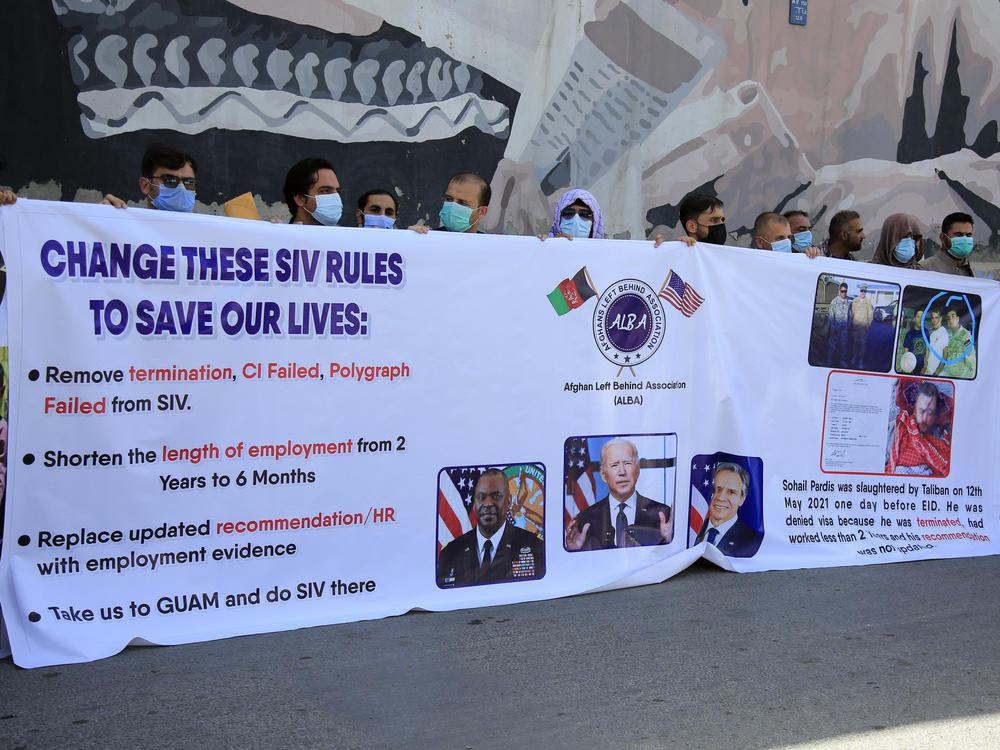 Former Afghan interpreters demonstrate in June outside the U.S. Embassy in Kabul. They called for the Biden administration to modify the rules and speed up the processing of U.S. visas that have been promised to Afghans who worked for the U.S. military over the past two decades. The visas are known as Special Immigrant Visas, or SIVs.