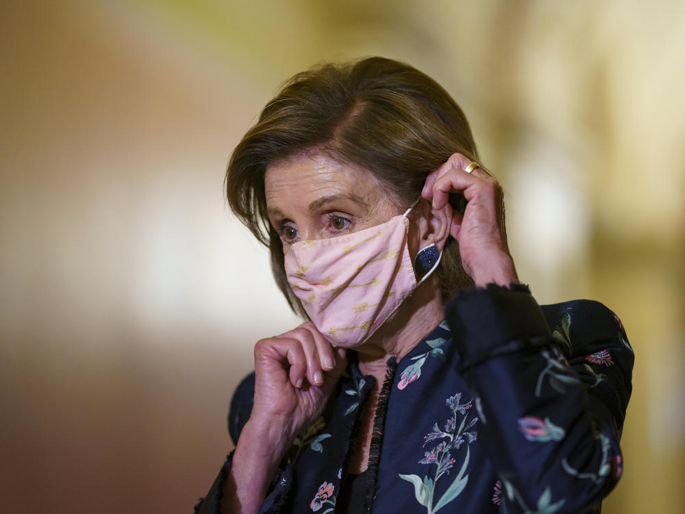 Speaker of the House Nancy Pelosi, D-Calif., wears a face mask as she hosts a visit by King Abdullah II of Jordan, at the Capitol in Washington, Thursday, July 22, 2021.