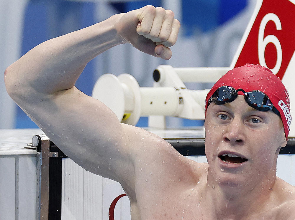 Britain's Tom Dean celebrates winning gold in the men's 200-meter freestyle swimming event at the Tokyo Olympics on Tuesday.