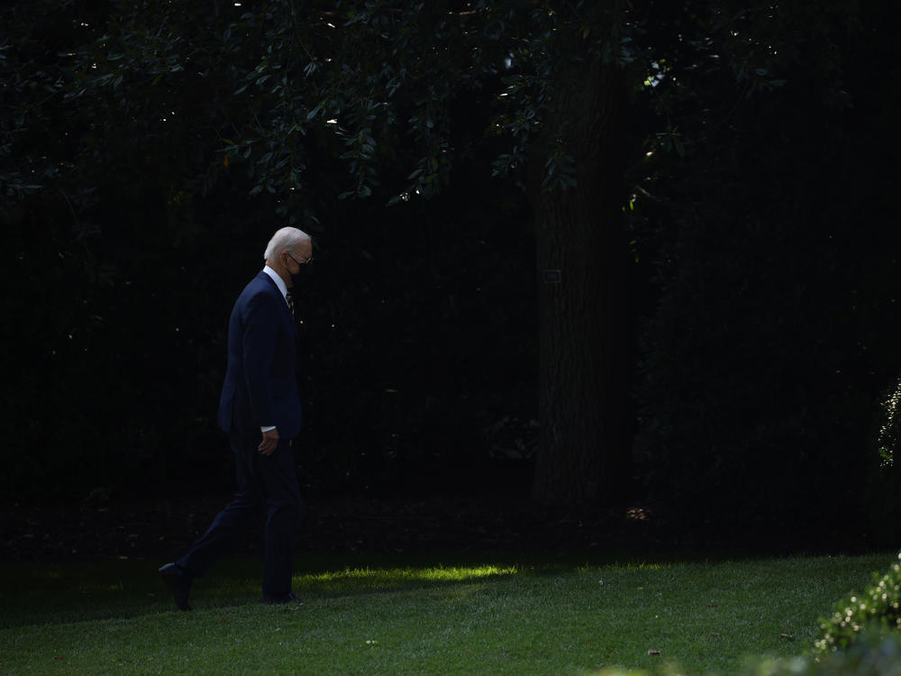 President Biden walks to the Oval Office after arriving on Marine One.