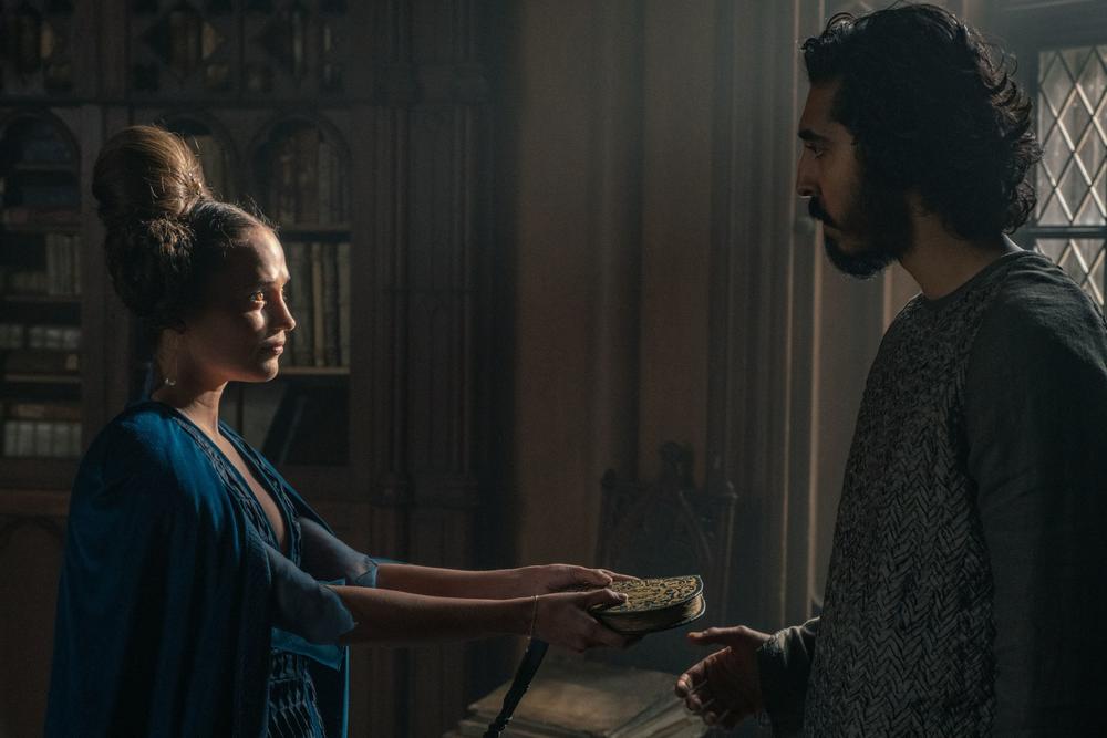 Essel (Alicia Vikander) and Gawain (Dev Patel) in <em>The Green Knight.</em>