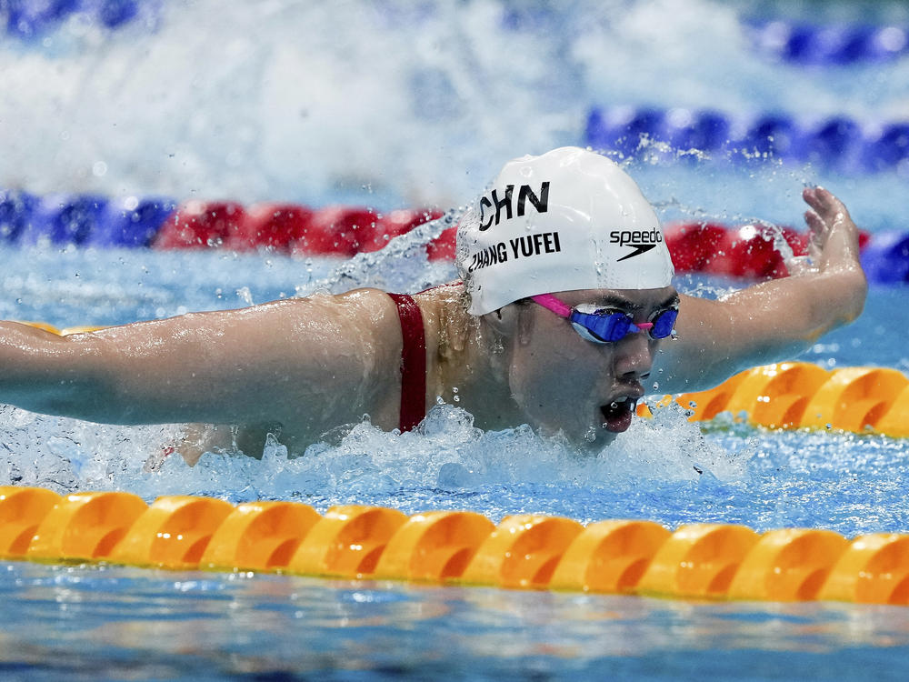 Zhang Yufei of China swims toward an Olympic record and gold medal in the women's 200-meter butterfly final at the Tokyo Olympics.