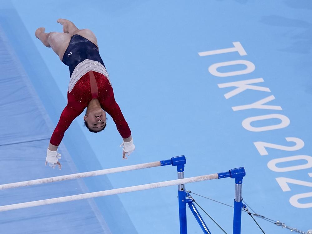 Sunisa Lee, of the United States, performs on the uneven bars during the artistic gymnastics women's final at the 2020 Summer Olympics, Tuesday, July 27, 2021, in Tokyo.
