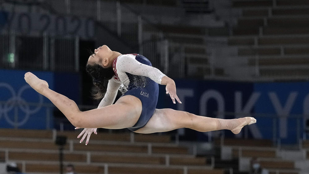 U.S. gold medalist Sunisa Lee performs on the floor during the gymnastics women's all-around final.