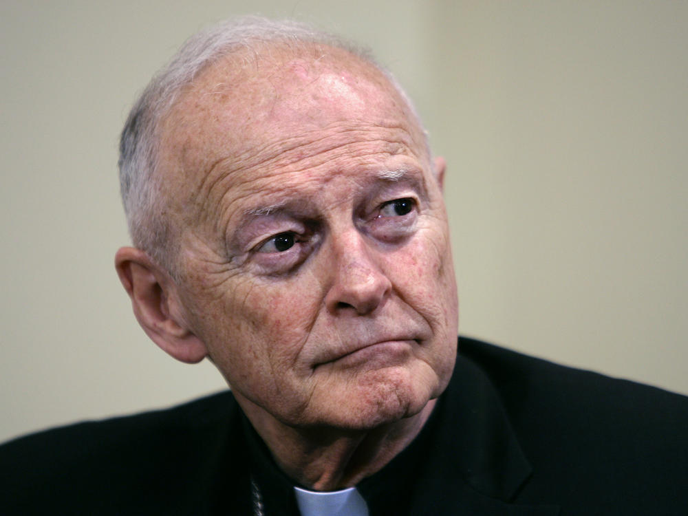 In this May 16, 2006 file photo former Washington Archbishop Theodore McCarrick pauses during a press conference in Washington. McCarrick, the once-influential cardinal who was defrocked after a Vatican investigation confirmed he had sexually molested adults as well as children, has been charged with sexually assaulting a 16-year-old boy during a wedding reception in the 1970s.