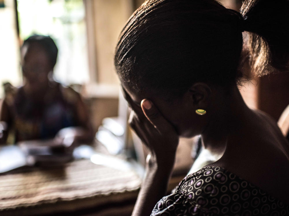 Counseling a newly diagnosed HIV patient in Kinshasa, Democratic Republic of Congo.