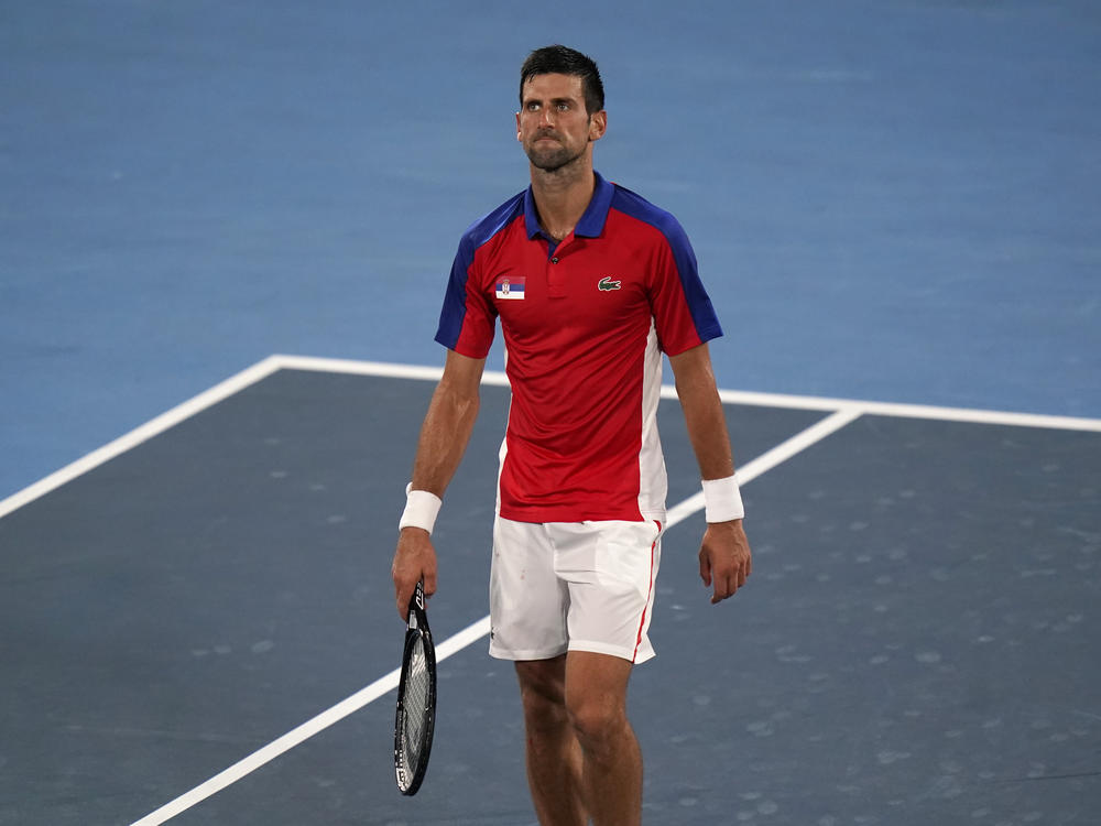 Serbia's Novak Djokovic reacts after he was defeated by Germany's Alexander Zverev during a semifinal match of the tennis competition on Friday at the Summer Olympics.