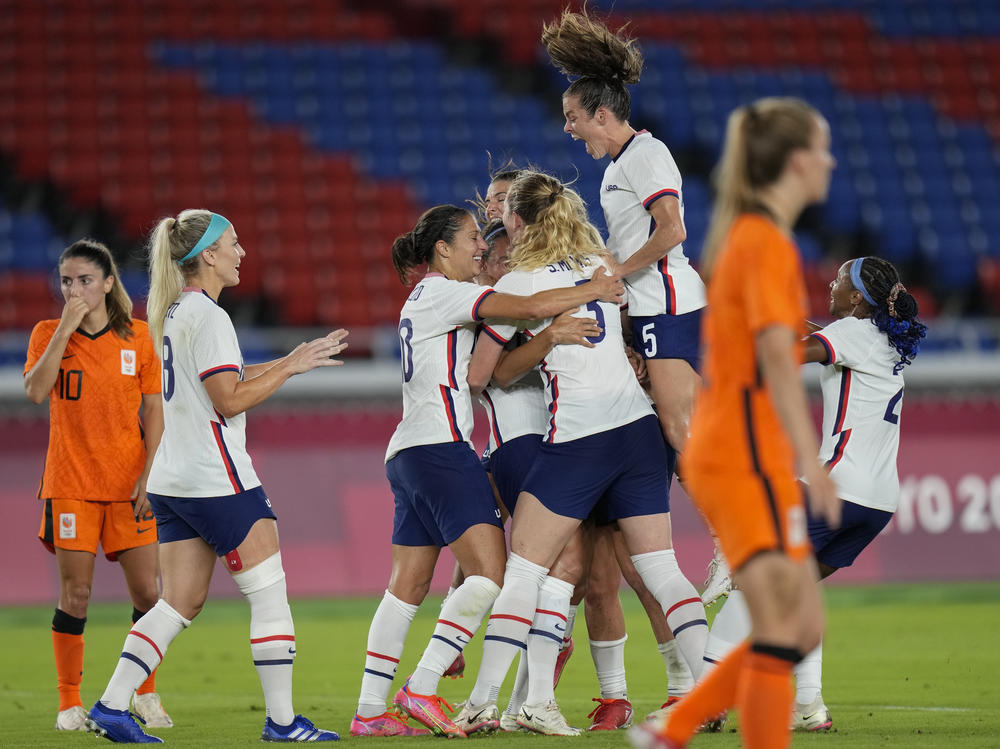 U.S. players celebrate a goal scored by teammate Lynn Williams during a women's quarterfinal soccer match against The Netherlands on Friday at the Summer Olympics in Yokohama, Japan.