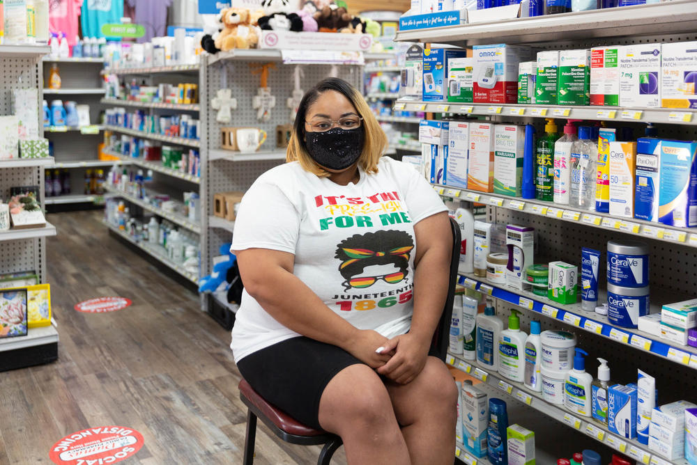 Violet Mallett waits in the Dumas Family Pharmacy after receiving the vaccine. She had been worried about side effects and was relieved to feel fine after getting the shot. 