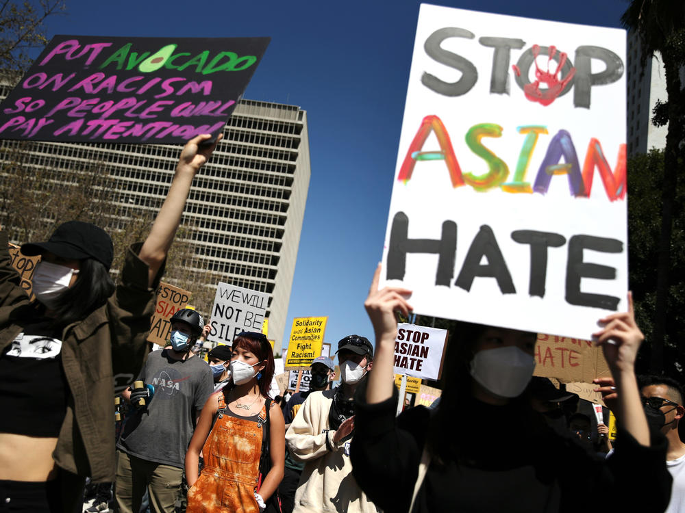 People demonstrate against anti-Asian violence and racism on March 27, 2021 in Los Angeles. A week earlier eight people were killed at three Atlanta-area spas, six of whom were Asian women, in an attack that sent fear through the Asian community amid a rise in anti-Asian hate crimes.