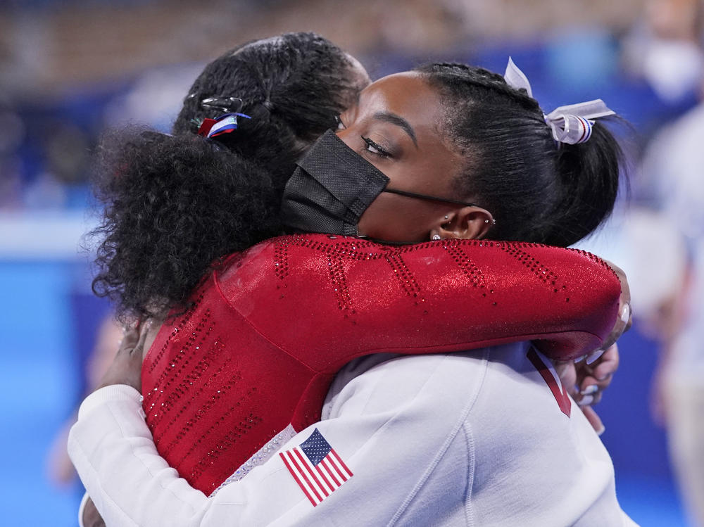 Simone Biles embraces teammate Jordan Chiles after she exited the team final at the Summer Olympics in Tokyo.