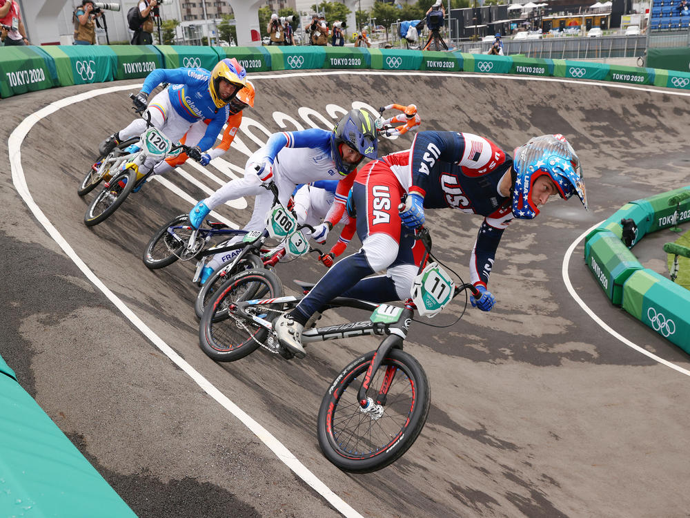 Connor Fields, of Team USA, leads the pack in a Men's BMX semifinal on Friday. He crashed not long after and was taken to the hospital.