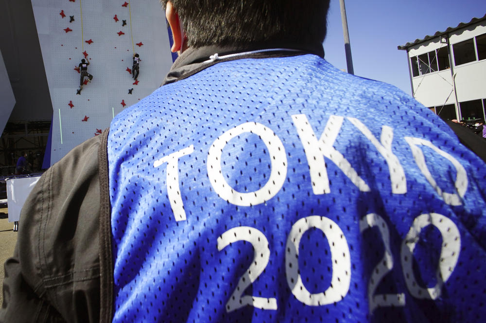 Staff test the speed climbing wall in preparation for the Olympic Games at Aomi Urban Sports Park in Tokyo.