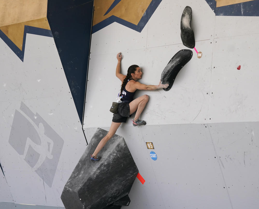 US Climber Kyra Condie's reduced spinal mobility means she has to put more thought into her movement on the bouldering wall.
