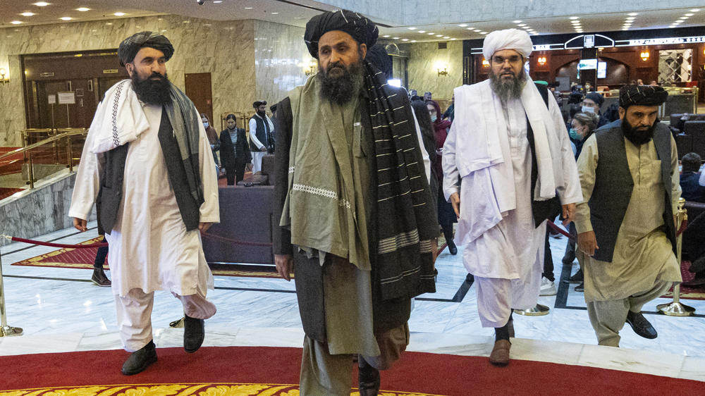 Taliban co-founder Mullah Abdul Ghani Baradar (center) arrives with other members of the Taliban delegation for an international peace conference in Moscow in March. A delegation of the Taliban visited Moscow in July to offer assurances that their quick gains in Afghanistan don't threaten Russia or its allies in Central Asia.