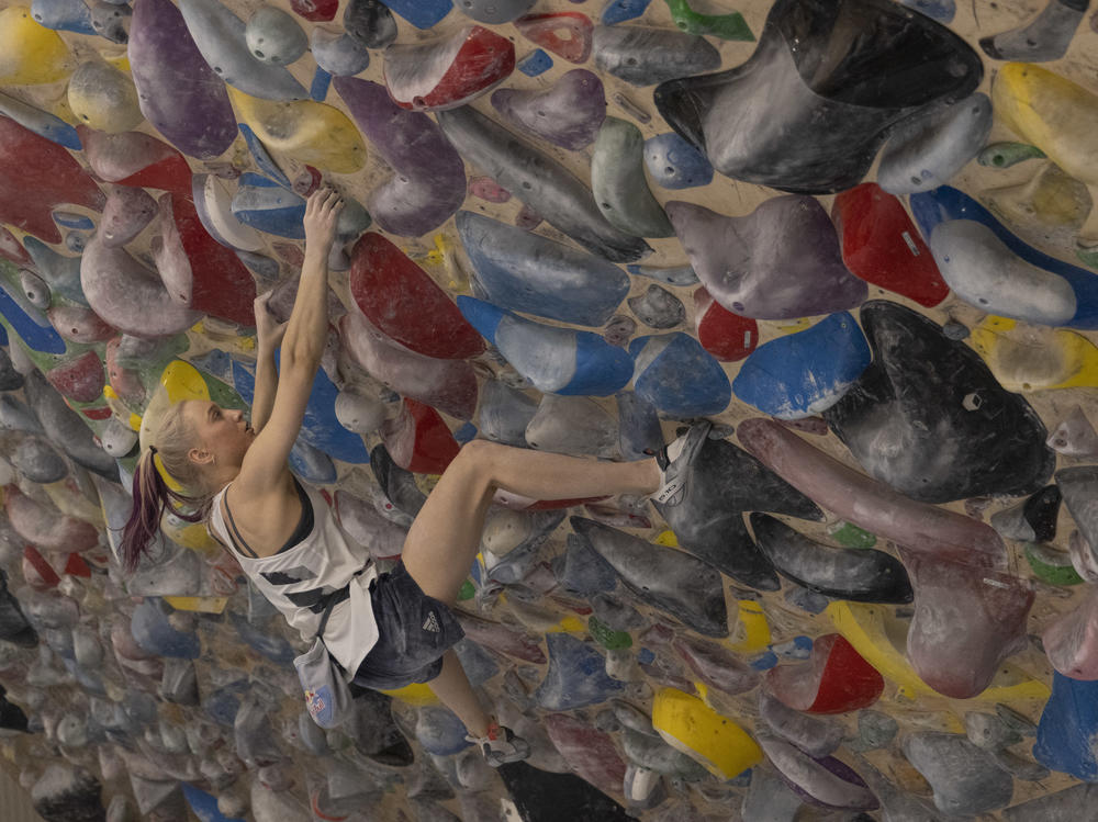 Slovenian climber Janja Garnbret, shown here training in June, is a star to watch at the debut of Olympic sport climbing.